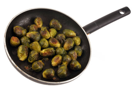 Brussels sprouts cooked in a pan close-up on white backgroundの写真素材
