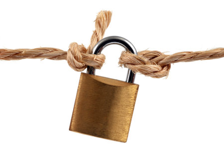 Padlock attached to a string close up on white