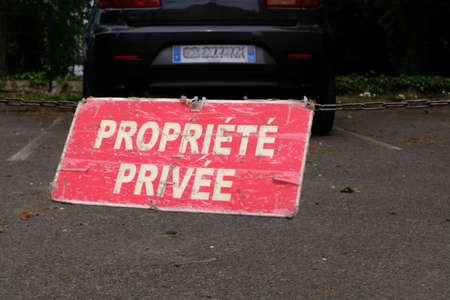 Sign on a parking lot indicating private property in frenchの写真素材