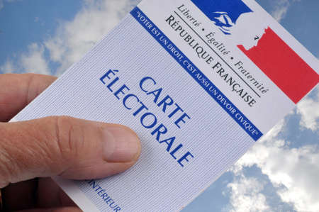 French electoral map in hand close up on sky backgroundのeditorial素材