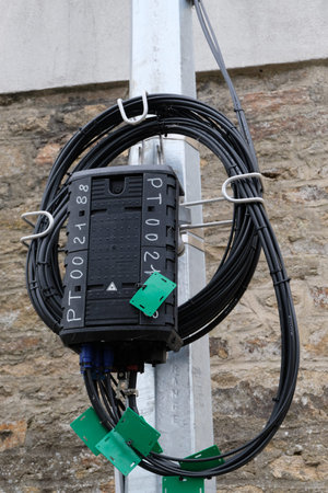 Electrical connection box with cables fixed on a pole