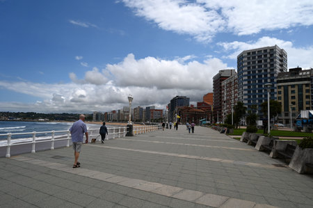 Walkway of San Lorenzo along the beach of Gijonのeditorial素材