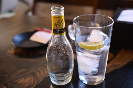 Glass and bottle of Schweppes close-upのeditorial素材