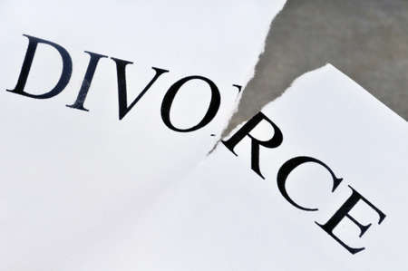 Divorce concept with torn sheet of paperの写真素材