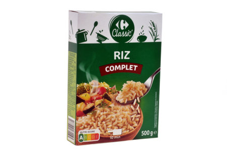 Box of Carrefour brand brown rice close-up on white backgroundのeditorial素材