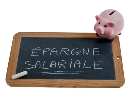 School slate on which is written in french salary savings with chalk and a piggy bank on a white...