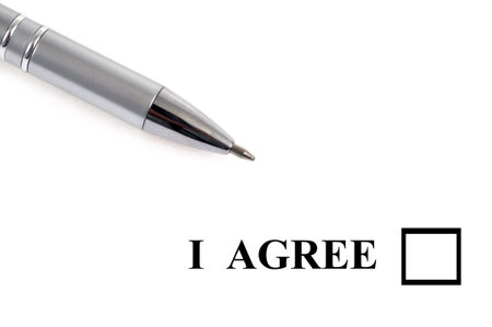 Pen with blank I agree box close up on white backgroundの写真素材