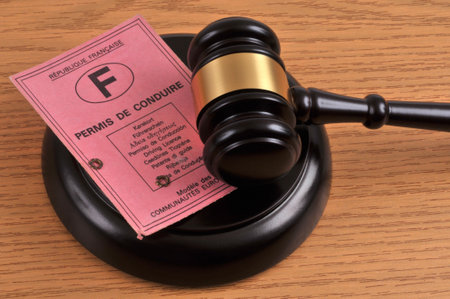French driving license withdrawal concept with a judge gavelの写真素材