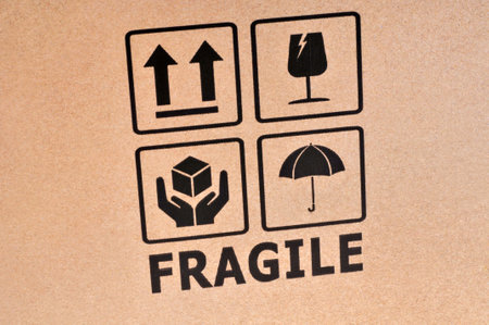 Fragile written on a cardboard close upの写真素材