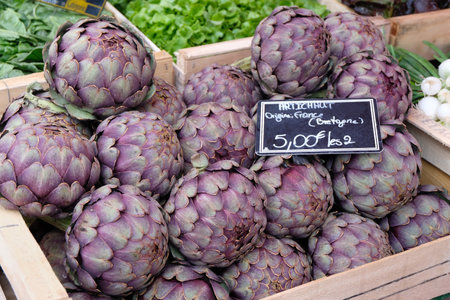 Breton artichokes on a market stall closeupの写真素材