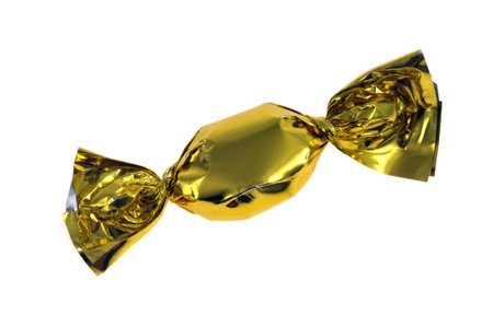 Candy in its wrapper close-up on a white backgroundの写真素材