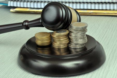Judge gavel and stacks of euro coins close upの写真素材