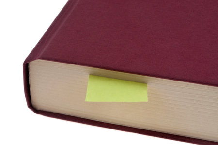 Bookmark in a book close up on a white backgroundの写真素材