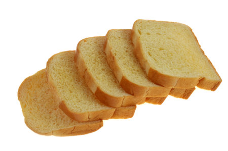 Slices of French brioche close-up on white background