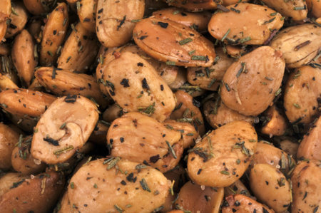 Herbed almonds closeup on backgroundの写真素材