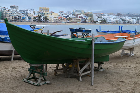 Boats on Las Canteras beach in Las Palmas de Gran Canaria with cloudy skyの写真素材