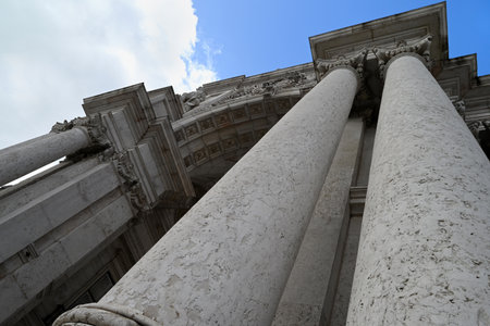 Columns of the Arc de Triomphe on Rue Augusta seen from a low angleの写真素材