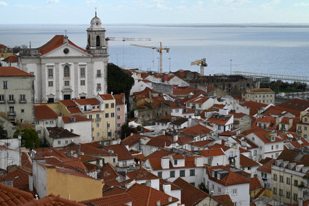 General view of Lisbon with the Church of Saint Stephen and the Tagus River in the backgroundの写真素材