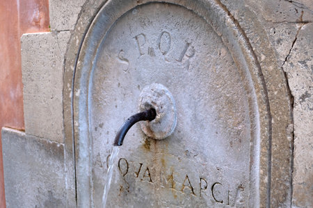Fountain with the coat of arms of ancient Romeの写真素材