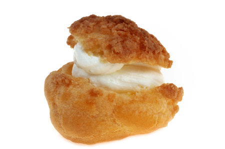 Homemade cream puff close-up isolated on white backgroundの写真素材