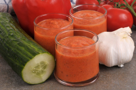 Closeup on homemade gazpacho verrines with its ingredientsの写真素材