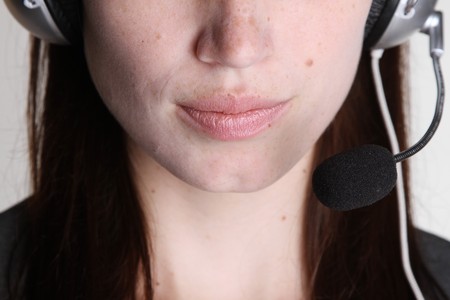 Woman with headsetの写真素材