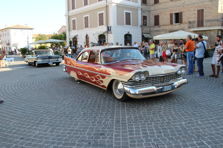Senigallia, Italy, 8 August 2019 is an international music festival focused on the music and culture of the United States of the 1950s. Pictured: people dressed in 50s style and car paradeのeditorial素材