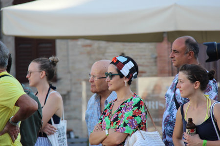 Senigallia, Italy, 6 August 2019 is an international music festival focused on the music and culture of the United States of the 1950s. Pictured: people dressed in 50s style and car paradeのeditorial素材