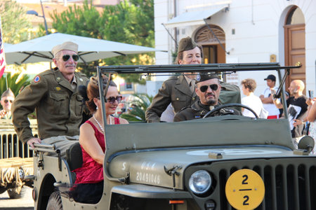 Senigallia, Italy, 6 August 2019 is an international music festival focused on the music and culture of the United States of the 1950s. Pictured: people dressed in 50s style and car paradeのeditorial素材