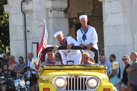 Senigallia, Italy, 6 August 2019 is an international music festival focused on the music and culture of the United States of the 1950s. Pictured: people dressed in 50s style and car paradeのeditorial素材