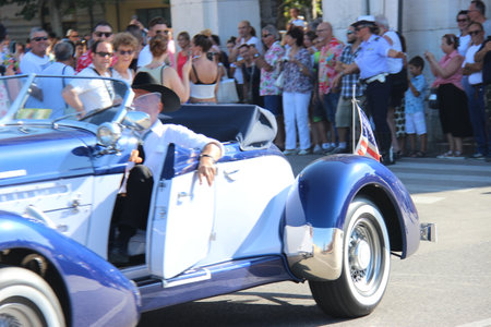 Senigallia, Italy, 6 August 2019 is an international music festival focused on the music and culture of the United States of the 1950s. Pictured: people dressed in 50s style and car paradeのeditorial素材