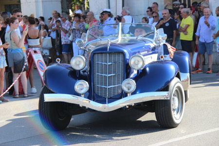 Senigallia, Italy, 6 August 2019 is an international music festival focused on the music and culture of the United States of the 1950s. Pictured: people dressed in 50s style and car paradeのeditorial素材