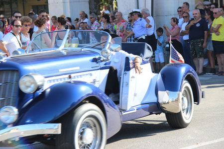 Senigallia, Italy, 6 August 2019 is an international music festival focused on the music and culture of the United States of the 1950s. Pictured: people dressed in 50s style and car paradeのeditorial素材