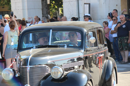 Senigallia, Italy, 6 August 2019 is an international music festival focused on the music and culture of the United States of the 1950s. Pictured: people dressed in 50s style and car paradeのeditorial素材