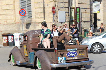 Senigallia, Italy 06 August 2019 is an international music festival focusing on American music and culture of the 1950s. In the photo: people dressed in the 50s and vintage carsのeditorial素材