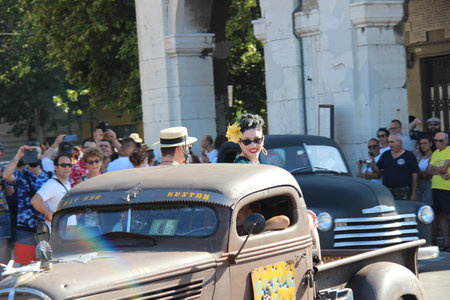Senigallia, Italy 06 August 2019 is an international music festival focusing on American music and culture of the 1950s. In the photo: people dressed in the 50s and vintage carsのeditorial素材