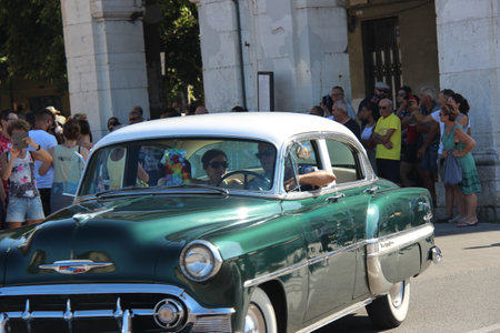 Senigallia, Italy 06 August 2019 is an international music festival focusing on American music and culture of the 1950s. In the photo: people dressed in the 50s and vintage carsのeditorial素材