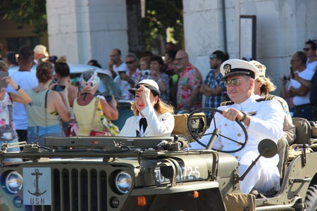 People vintage, Senigallia, Italy 12 August 2019 is an international music festival focused on American music and culture of the 1950s. In the photo: people dressed in vintage 1950s styleのeditorial素材