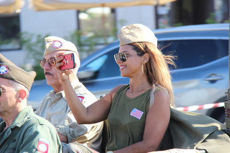 People vintage, Senigallia, Italy 12 August 2019 is an international music festival focused on American music and culture of the 1950s. In the photo: people dressed in vintage 1950s styleのeditorial素材