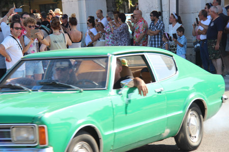 People vintage, Senigallia, Italy 12 August 2019 is an international music festival focused on American music and culture of the 1950s. In the photo: people dressed in vintage 1950s styleのeditorial素材