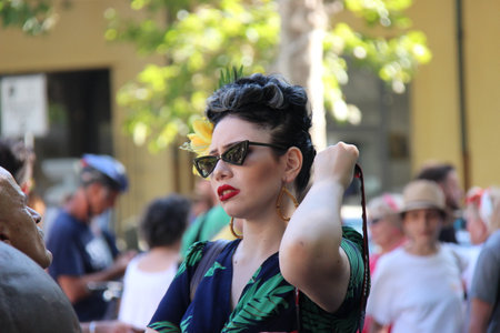 Senigallia, Italy 8, August 2019 is an international music festival focused on the US music and culture of the fifties. In the photo: people dressed up in the 50s style Summer Jamboreeのeditorial素材