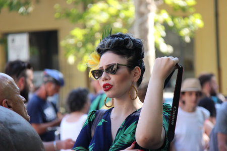 Senigallia, Italy 8, August 2019 is an international music festival focused on the US music and culture of the fifties. In the photo: people dressed up in the 50s style Summer Jamboreeのeditorial素材