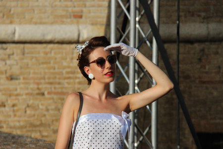 Senigallia, Italy 12 August 2019 is an international music festival focused on the US music and culture of the fifties. In the photo: people dressed up in the 50s styleのeditorial素材