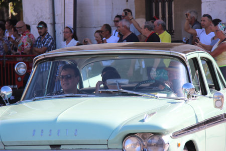 Senigallia, Italy, 10 August 2019 is an international music festival focused on the music and culture of the United States of the 1950s. Pictured: people dressed in 50s style and car paradeのeditorial素材