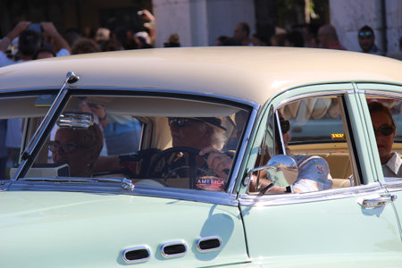 Senigallia, Italy, 10 August 2019 is an international music festival focused on the music and culture of the United States of the 1950s. Pictured: people dressed in 50s style and car paradeのeditorial素材