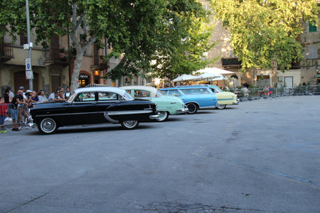 Senigallia, Italy, 10 August 2019 is an international music festival focused on the music and culture of the United States of the 1950s. Pictured: people dressed in 50s style and car paradeのeditorial素材