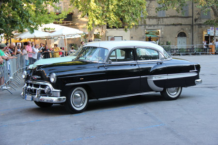 Senigallia, Italy, 10 August 2019 is an international music festival focused on the music and culture of the United States of the 1950s. Pictured: people dressed in 50s style and car paradeのeditorial素材