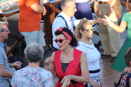 Senigallia, Italy 12 August 2019 is an international music festival focused on the US music and culture of the fifties. In the photo: people dressed up in the 50s style Summer Jamboreeのeditorial素材