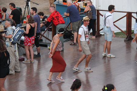 Senigallia, Italy 12 August 2019 is an international music festival focused on the US music and culture of the fifties. In the photo: people dressed up in the 50s style Summer Jamboreeのeditorial素材