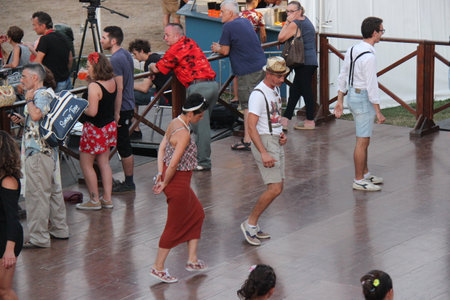 Senigallia, Italy 12 August 2019 is an international music festival focused on the US music and culture of the fifties. In the photo: people dressed up in the 50s style Summer Jamboreeのeditorial素材